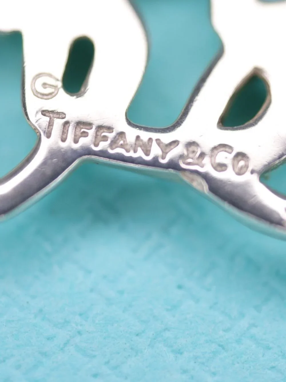 Tiffany & Co. Three Hearts Pendant on 16